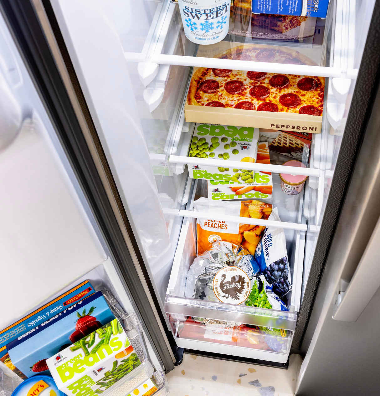 GE® 23.6 Cu. Ft. Counter-Depth Side-By-Side Refrigerator with Extra Tall Dispenser and In-Door Icemaker