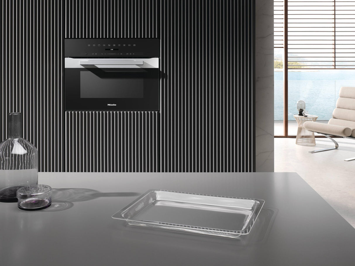 H 7240 BM AM Clean Touch Steel - 24" compact speed oven in a perfectly combinable design with automatic programs and combi modes.