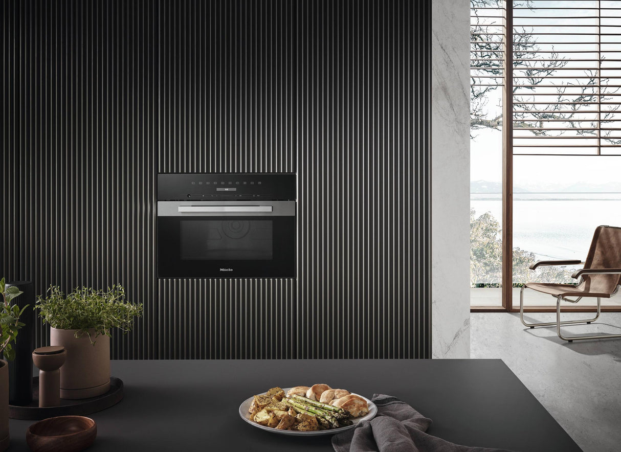 M 7240 TC AM Clean Touch Steel - Built-in microwave oven, 24" width in a design that is the perfect complement with controls on the top.
