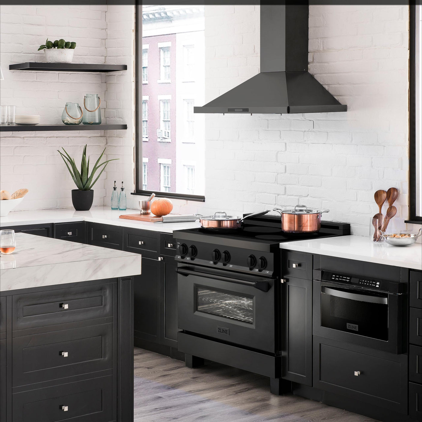ZLINE 36" 4.6 cu. ft. Induction Range with a 5 Element Stove and Electric Oven in Black Stainless Steel (RAIND-BS-36)