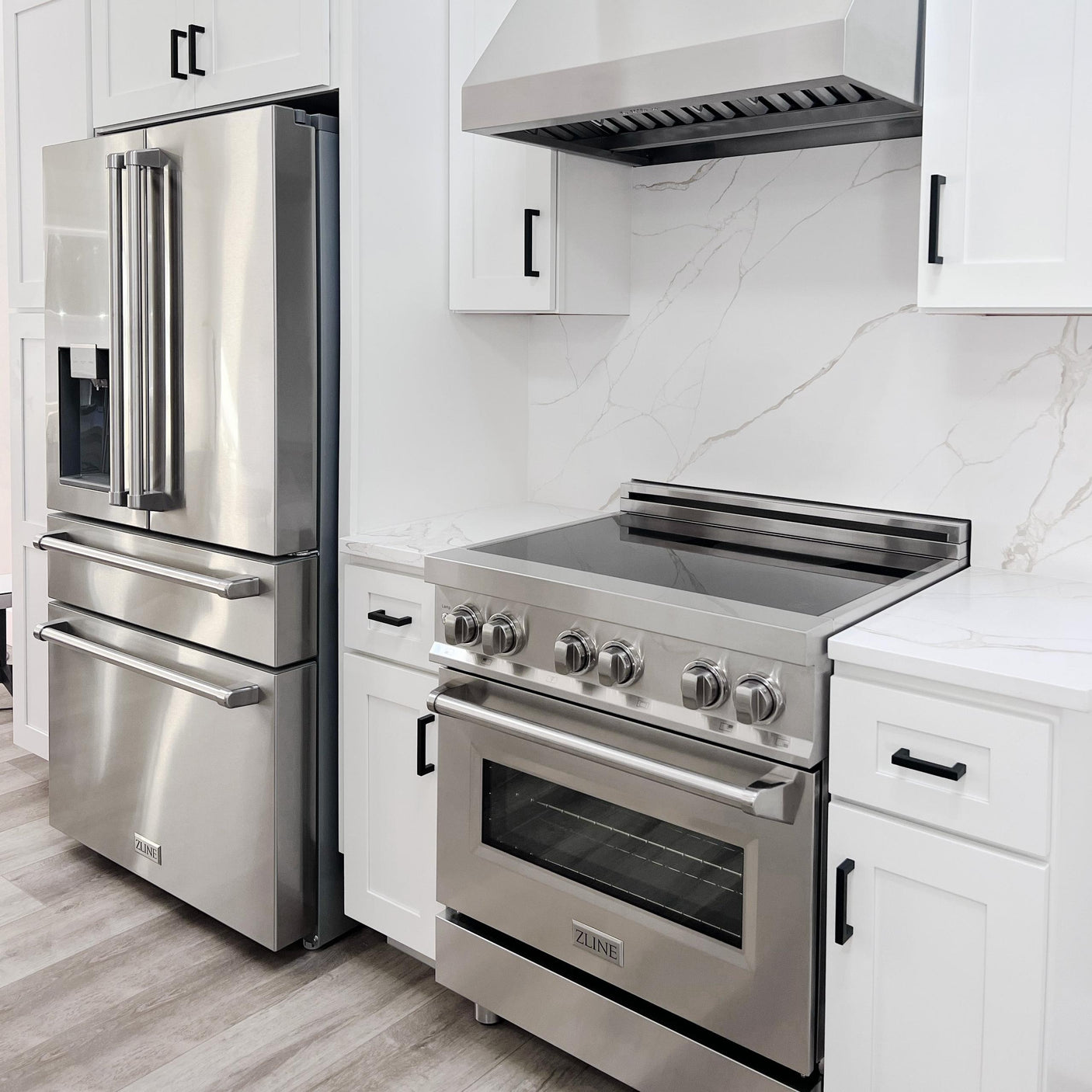 ZLINE 30" 4.0 cu. ft. Induction Range with a 4 Element Stove and Electric Oven in Stainless Steel (RAIND-30) [Color: Stainless Steel]
