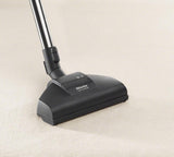 Compact C2 Onyx PowerLine - SDAE0 Canister vacuum cleaners with protective parquet floorhead for first-class care of delicate hard floors.
