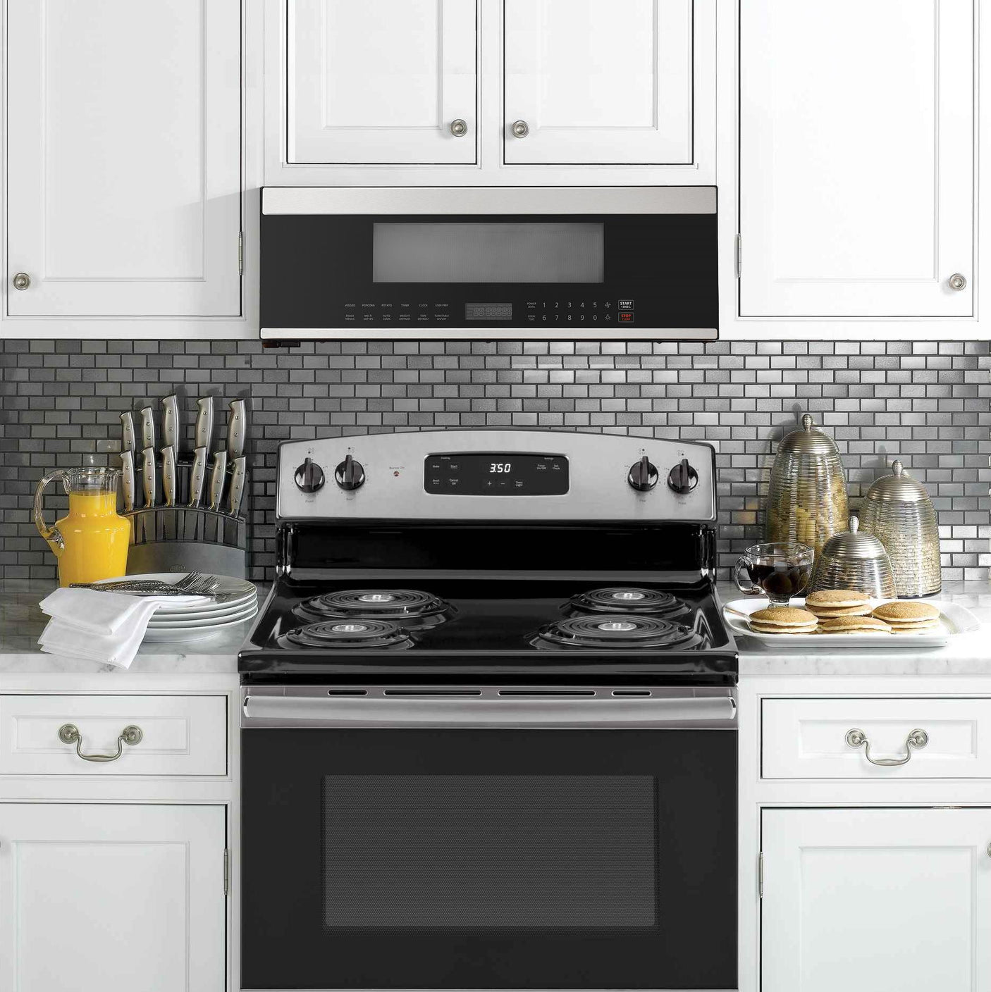 Low-Profile 30" Over-The-Range Microwave Oven in Black Glass with Stainless Steel Trim