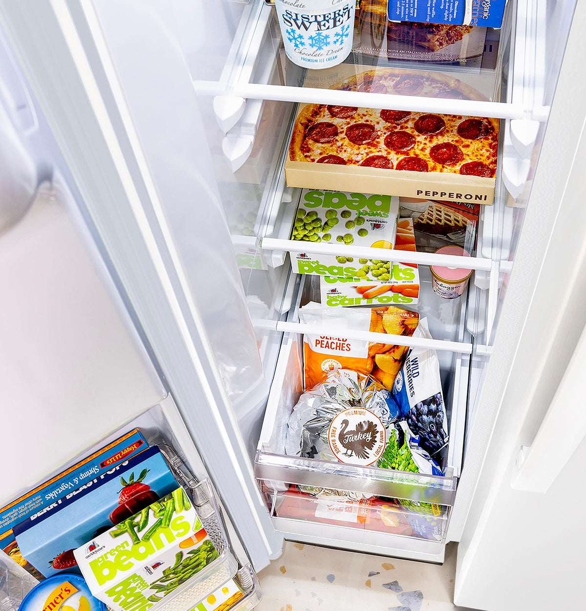 GE® 23.6 Cu. Ft. Counter-Depth Side-By-Side Refrigerator with Extra Tall Dispenser and In-Door Icemaker