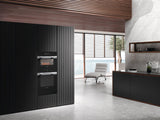 H 7840 BM AM Clean Touch Steel - 24" compact speed oven in a perfectly combinable design with automatic programs and roast probe.