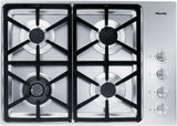 KM 3464 LP Gas cooktop with a dual wok burner for particularly wide ranging burner capacity.