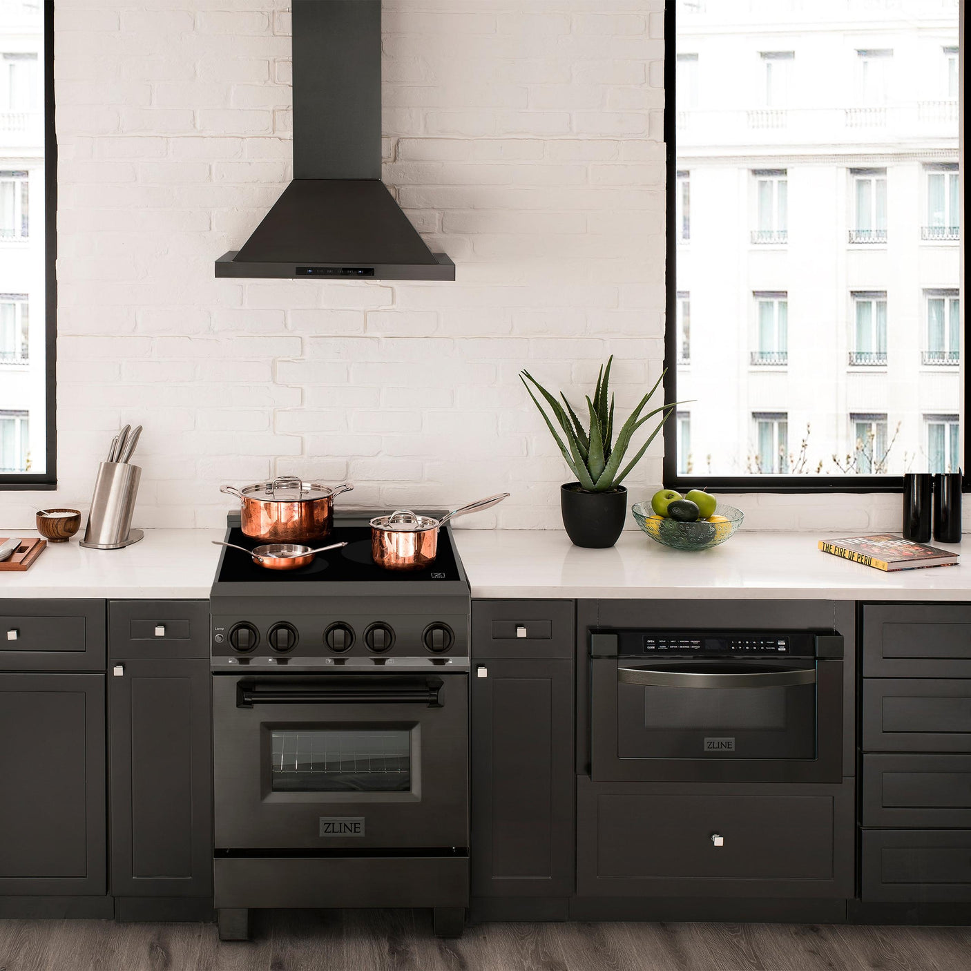 ZLINE 24" 2.8 cu. ft. Induction Range with a 4 Element Stove and Electric Oven in Black Stainless Steel (RAIND-BS-24)