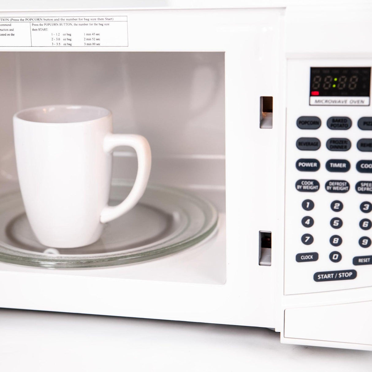 0.7 cu. ft. Microwave Oven - White / 0.7 cu. ft.