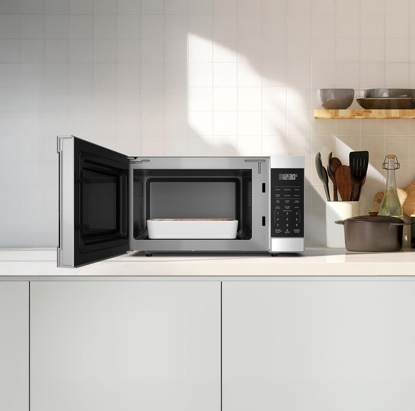 Sharp 1.1 cu. ft. 1100W Flatbed Countertop Microwave Oven with Inverter Technology
