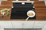 800 Series Induction Cooktop 36'' Black, surface mount without frame NIT8669UC